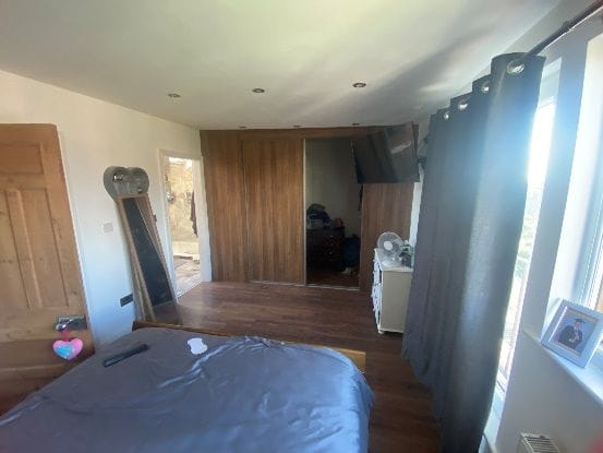 The new principal bedroom in the converted loft