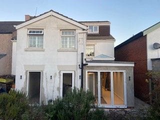 Completed single-storey extension with a roof lantern and bi-fold doors