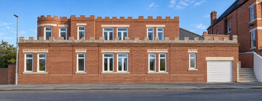 Design visualisation of the proposed first-floor extension from the side, showing the reduced corner turret