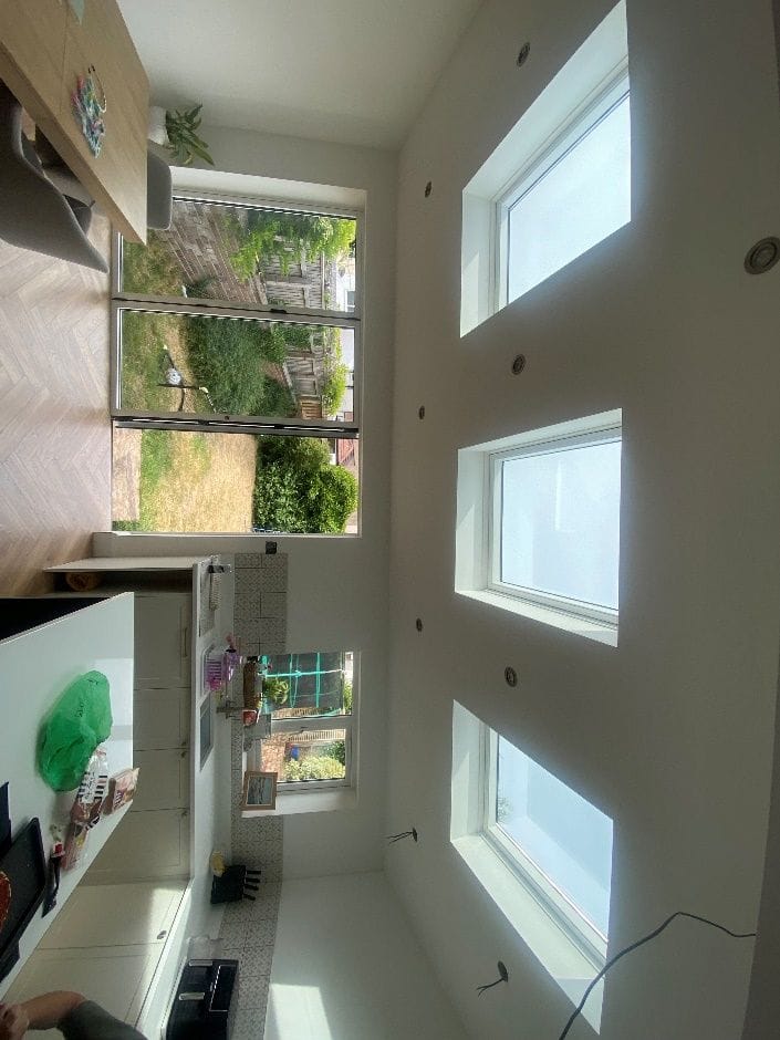 The finished open-plan living space looking towards the garden
