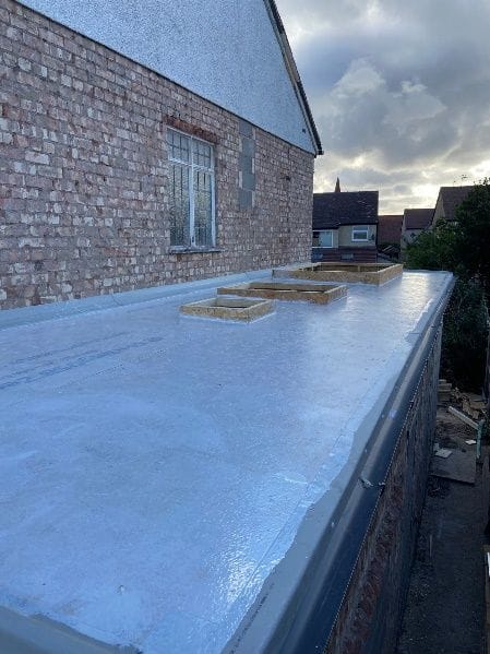 Rooflight openings formed in the new flat roof
